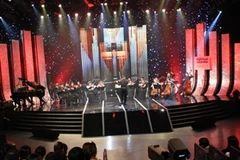 Quang cảnh lễ trao giải Cống hiến 2011 do Báo VH&TT tổ chức thường niên (Ảnh: Quang Nhựt/TTXVN)