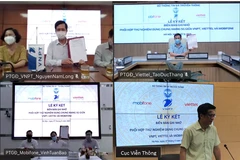 Các nhà mạng tổ chức lễ ký kết trực tuyến dưới dự chứng kiến của Cục Viễn thông. (Ảnh: Cục Viễn thông)