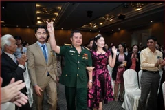 Bị can Lê Xuân Giang (mặc quân phục) tại một cuộc hội thảo của Liên kết Việt. (Nguồn: lkv.com.vn)