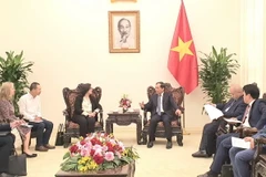 Phó Thủ tướng Bùi Thanh Sơn tiếp Phó Chủ tịch Ngân hàng Thế giới Manuela V.Ferro. (Ảnh: Chu Thanh Vân/TTXVN)