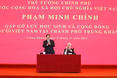 Thủ tướng Phạm Minh Chính tại cuộc gặp lưu học sinh và cộng đồng người Việt Nam tại thành phố Trùng Khánh, Trung Quốc. (Ảnh: Dương Giang/TTXVN)