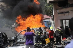 Hiện trường một vụ đánh bom ở Mogadishu, Somalia ngày 29/1. (Ảnh: AFP/TTXVN)