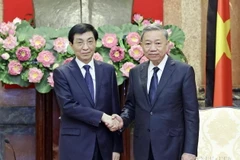 Chủ tịch nước Tô Lâm tiếp đồng chí Vương Hộ Ninh, Ủy viên Thường vụ Bộ Chính trị Trung ương Đảng Cộng sản Trung Quốc, Chủ tịch Chính hiệp Toàn quốc Trung Quốc sang chia buồn với Đảng, Nhà nước, Nhân dân Việt Nam và dự Quốc tang Tổng Bí thư Nguyễn Phú Trọng, chiều 25/7/2024. Ảnh: Nhan Sáng-TTXVN