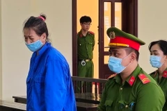 Bị cáo Nguyễn Thị Bạch Huệ tại phiên tòa xét xử. (Ảnh: TTXVN phát)
