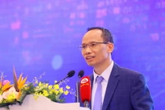 Ông Cấn Văn Lực, Chuyên gia Kinh tế trưởng Ngân hàng BIDV. (Ảnh: Văn Điệp/TTXVN)