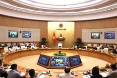 Phó Thủ tướng Trần Lưu Quang chủ trì họp Ban Chỉ đạo quốc gia về IUU. (Ảnh: Lâm Khánh/TTXVN)