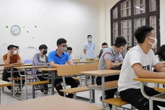 Các thí sinh được phổ biến quy chế thi (Ảnh: Hoàng Đạt/Vietnam+)