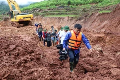 Các phóng viên báo chí cần dấn thân để đẩy lùi những tiêu cực trong xã hội. (Ảnh minh họa: TTXVN)