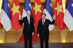Chủ tịch Quốc hội Vương Đình Huệ và Chủ tịch Quốc hội Phần Lan Jussi Halla-aho. (Ảnh: Nhan Sáng/TTXVN)