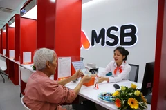 Giao dịch tại MSB. (Ảnh: CTV/Vietnam+)