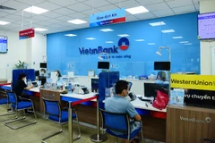 VietinBank tiếp tục giảm lãi suất cho vay lên tới 1%/năm cho các khách hàng chịu tác động tiêu cực của dịch bệnh COVID-19. (Ảnh: Vietnam+)