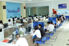 Giao dịch tại VietinBank. (Ảnh: Vietnam+)