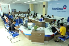 Giao dịch tại VietinBank. (Ảnh: Vietnam+)
