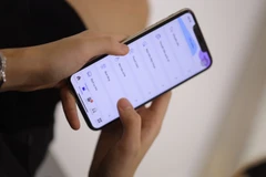 Sử dụng App MBBank để xử lý gọn gàng những công việc tài chính gia đình là bí quyết giúp NTK Hoà Nguyễn cân bằng cuộc sống. (Ảnh: Vietnam+)