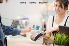 Chủ thẻ DFS trên toàn cầu có thể giao dịch, thanh toán tại các điểm chấp nhận thanh toán của BIDV tại Việt Nam. (Ảnh: CTV/Vietnam+)