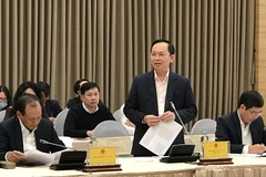 Phó Thống đốc Ngân hàng Nhà nước Đào Minh Tú phát biểu tại cuộc họp báo. (Ảnh: PV/Vietnam+)