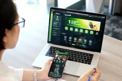 Từ 1/1/2022, khách hàng chuyển khoản nội và ngoại mạng được miễn phí trên VCB Digibank. (Ảnh: Vietnam+)