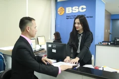 Giao dịch tại Công ty chứng khoán BSC. (Ảnh: Vietnam+)