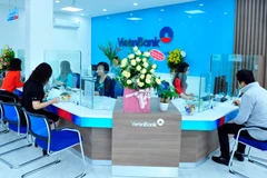Giao dịch tại VietinBank. (Ảnh: Vietnam+)