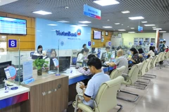 Giao dịch tại VietinBank. (Ảnh: Vietnam+)
