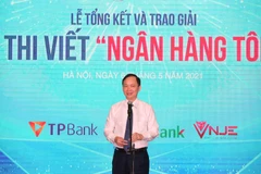 Ông Đào Minh Tú, Phó Thống đốc Ngân hàng Nhà nước phát biểu tại lễ trao giải. (Ảnh: CTV/Vietnam+)