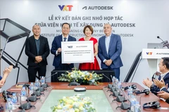 Lễ ký kết bản ghi nhớ hợp tác giữa Viện Kinh tế Xây dựng thuộc Bộ Xây dựng và Autodesk. (Ảnh: Vietnam+ phát)