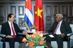 Chủ tịch nước Trần Đại Quang gặp Chủ tịch Quốc hội Cuba Esteban Lazo. (Ảnh: Nhan Sáng/TTXVN)