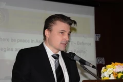 Học giả Henning Glaser, Giám đốc Trung tâm CPG phát biểu khai mạc Hội thảo. (Ảnh: Quang Thuận/Vietnam+)