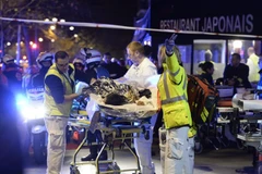 Hình ảnh đau thương một năm về trước ở Paris. (Nguồn: AP)