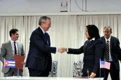 Quang cảnh lễ ký thỏa thuận. (Ảnh: Vũ Lê Hà/TTXVN)