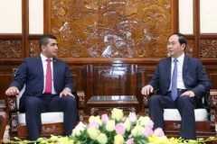 Chủ tịch nước Trần Đại Quang tiếp Đoàn xúc tiến thương mại Madagascar, do ông Eric Andry Ramiandrasoa, Lãnh sự danh dự Việt Nam tại Cộng hòa Madagascar làm Trưởng đoàn. (Ảnh: Nhan Sáng/TTXVN)