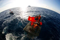 "Chủ quyền biển đảo" của tác giả Trần Thành - một bức ảnh được trưng bày tại triển lãm. (Ảnh: BTC)