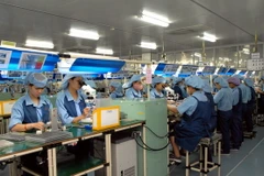 Dây chuyền sản xuất linh kiện điện tử. (Ảnh: Phạm Kiên/TTXVN)