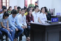 Các bị cáo tại phiên xét xử. (Ảnh: Sỹ Tuyên/TTXVN)