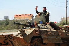 Binh sỹ Chính phủ Syria tiến vào giải phóng thị trấn Kahil, tỉnh Daraa. (Nguồn: THX/TTXVN)