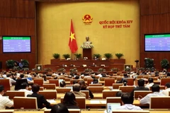 Sáng 20/11, Quốc hội biểu quyết Bộ luật Lao động (sửa đổi). (Ảnh: Doãn Tấn/TTXVN)