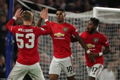 Rashford (giữa) mang chiến tháng về cho Manchester United.