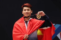 Trịnh Văn Vinh giành HCV. (Nguồn: Tuoitre)