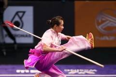 Sáng 21/8, vận động viên Wushu Dương Thúy Vy đã xuất sắc đoạt Huy chương Vàng ở nội dung thương thuật nữ với 9,67 điểm. (Ảnh: Quốc Khánh/TTXVN)