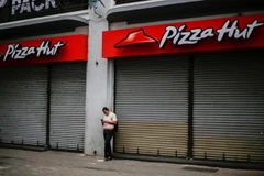 Cửa hàng pizza đóng cửa do dịch COVID-19 tại San Jose, Costa Rica. (Nguồn: Reuters) 