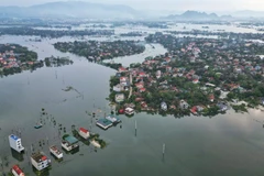 Toàn xã Hoàng Văn Thụ có 1161 hộ với 4954 nhân khẩu bị ảnh hưởng do ngập lụt. (Ảnh: Tuấn Anh/TTXVN)