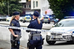 Cảnh sát có mặt tại hiện trường vụ nổ súng. (Nguồn: AP)