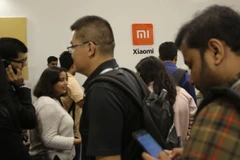 Khách tham quan tại sự kiện ra mắt sản phẩm mới của Xiaomi tại Bangalore.(Ảnh: AP)
