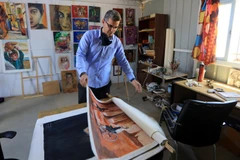 Nghệ sỹ người Syria cho biết anh thường vẽ nên một tương lai tươi sáng và tích cực hơn.(Nguồn: Global Times)