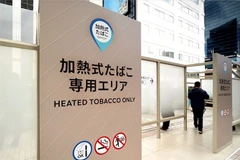 Một bảng hiệu tại Tokyo (Nhật Bản) cấm hút thuốc lá điếu, cho phép sử dụng thuốc lá làm nóng. (Nguồn: Shutterstock)