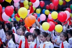 Không khí tưng bừng trong lễ khai giảng năm học mới. (Ảnh: TTXVN)