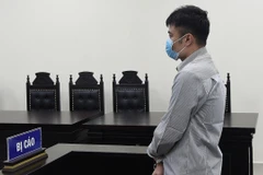 Bị cáo Đặng Văn Nhân tại phiên tòa sáng 9/9. (Ảnh: Danh Lam)