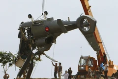 Xác trực thăng rơi ở khu vực sườn núi Yav Yai. (Nguồn: China Morning Post)