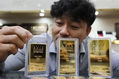 Vàng miếng được trưng bày tại sàn giao dịch ở Seoul, Hàn Quốc. (Nguồn: Yonhap/TTXVN) 
