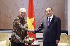 Chủ tịch nước Nguyễn Xuân Phúc tiếp Chủ tịch Hội Hữu nghị Indonesia - Việt Nam Budiarsa Sastrawinata. (Ảnh: Thống Nhất/TTXVN)